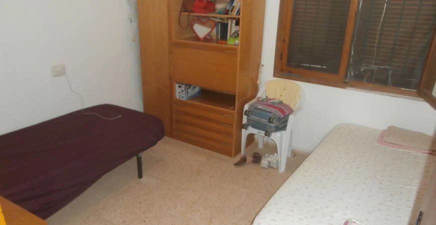 Dormitorio y su mobiliario